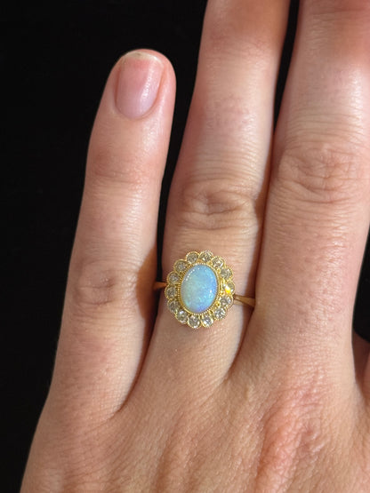 Lady's Yellow 18 Karat Princess Di Fashion Ring Size 6.75 With 0.42Tw Round G/H Si1 Diamonds And One 8.00X6.00Mm Oval Opal