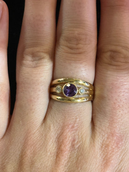 Lady's Yellow 14 Karat Free Form Fashion Ring With One 0.90Ct Round Amethyst And 2=0.12Tw Round Diamonds