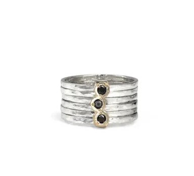 Beautiful Sterling Silver Meditation Ring featuring a Yellow Gold accent bar with three stunning Black Diamonds and 6 Silver hand hammered spinning bands.